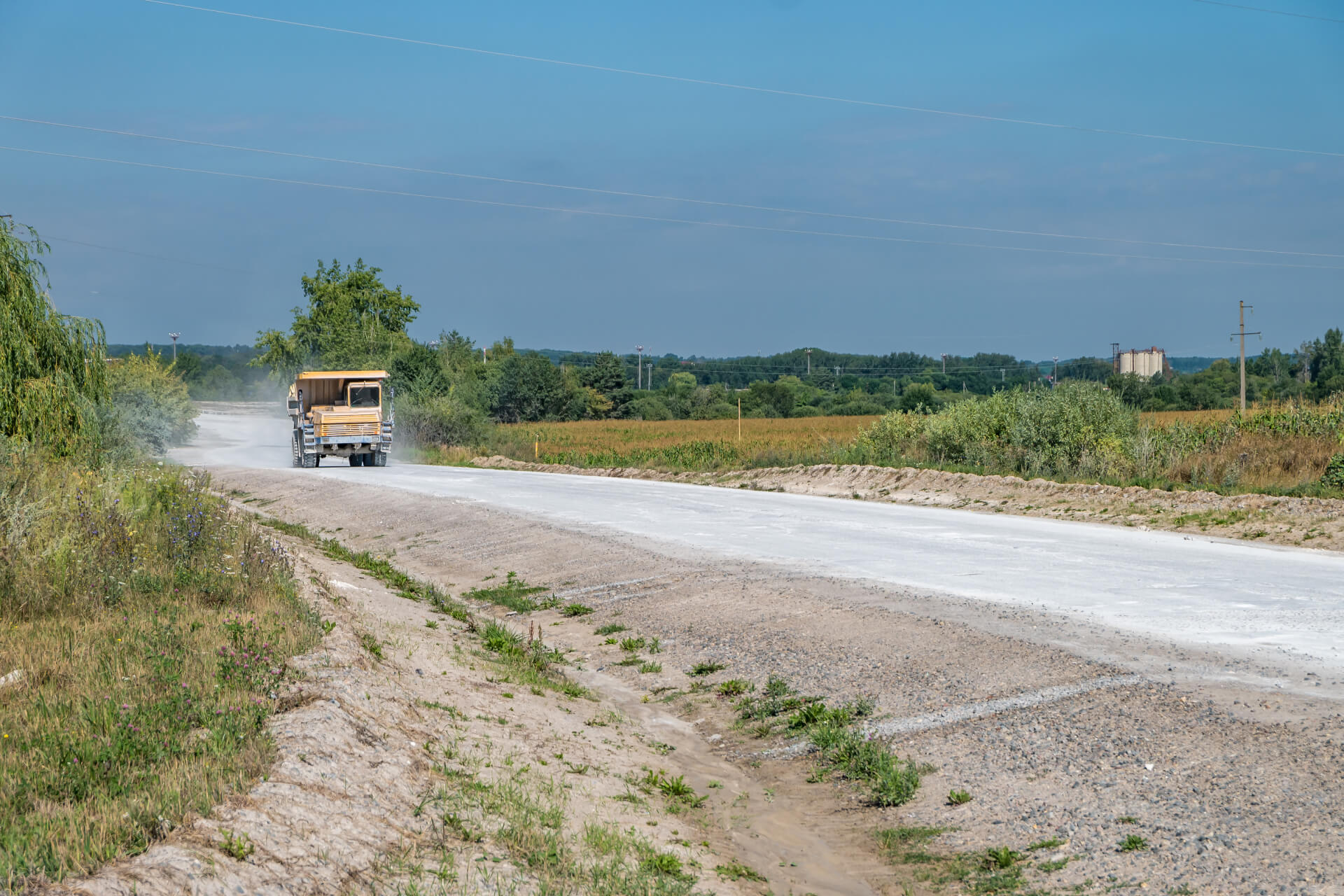 Large dump truck loaded with rocks drive on dust r 2025 03 08 21 09 46 utc 2